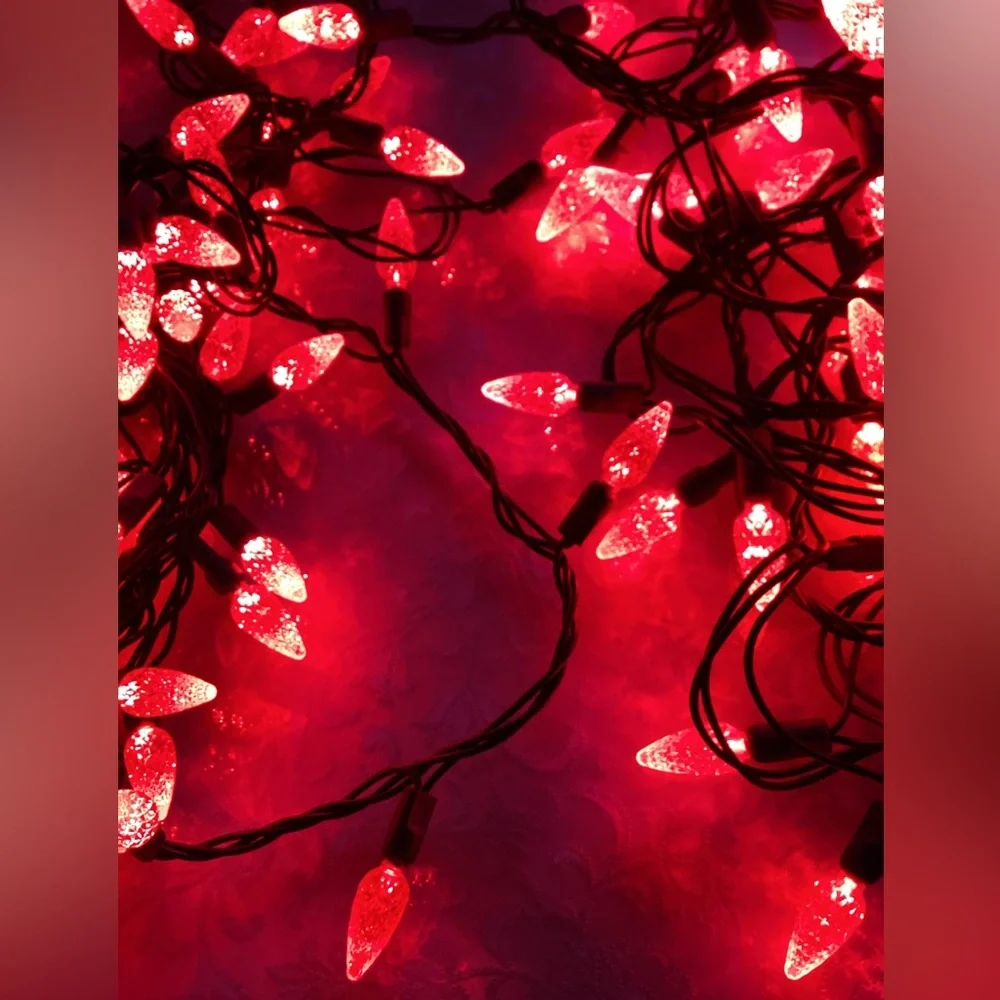 2 Christmas strings red light, bulbs faceted cone shape.